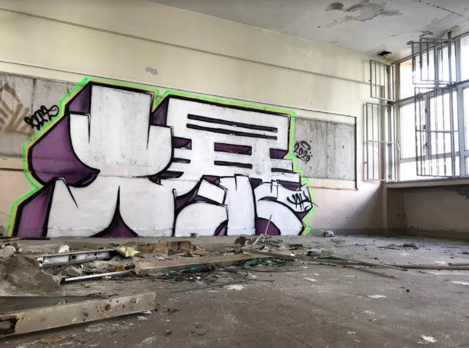 Picture of Hong Kong graffiti in abandon school by Hong Kong artist Boms